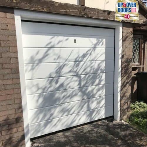 AluTech M Rib Insulated Sectional Door in White with Dressed Timber Frame and External Release Mechanism