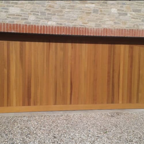 Cedar Door Haddon Timber Garage Door in Light Oak with Matching Timber Frame