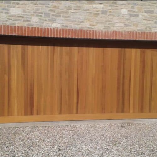 Cedar Door Haddon Timber Garage Door in Light Oak with Matching Timber Frame