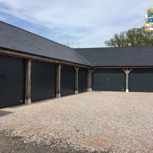 Overlap Garage Doors in Anthracite Grey on Oak Barn