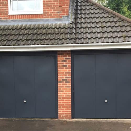 Pair of Garador Design 100 Up & Over Doors in Titan Metallic with Brushed Metal Handles