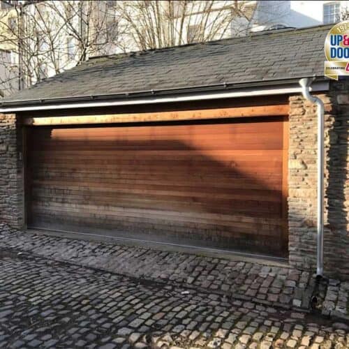 Weathered Cedar Door Edale Solid Timber Sectional Garage Door   Base Coated Only